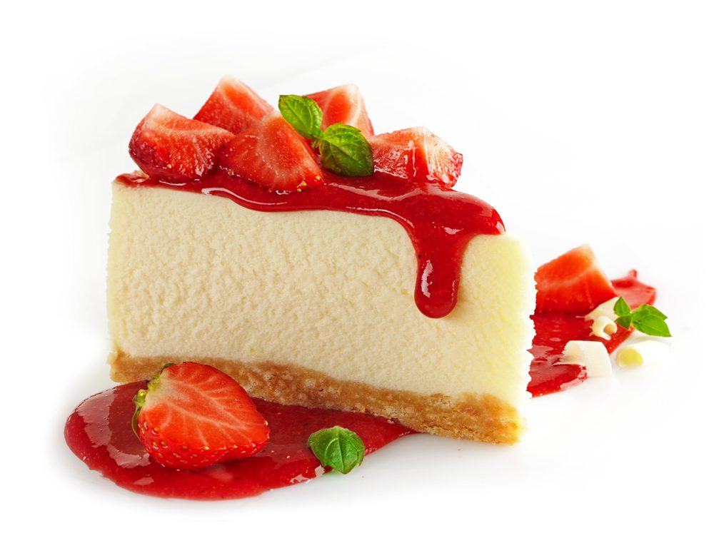 A piece of cheesecake with strawberries on top.