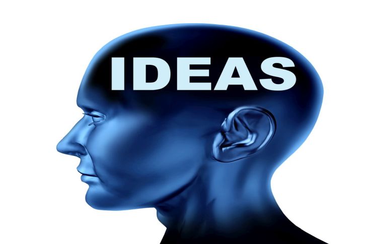 Ideas and creativity symbol represented by an isolated human head with the word idea on the brain.