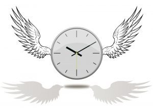 A clock with wings on it's face.