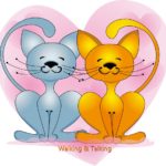Two cats sitting next to each other in front of a heart.