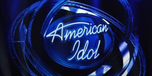 A neon sign that reads " american idol ".