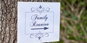 A sign that says family reunion with an arrow pointing to the right.