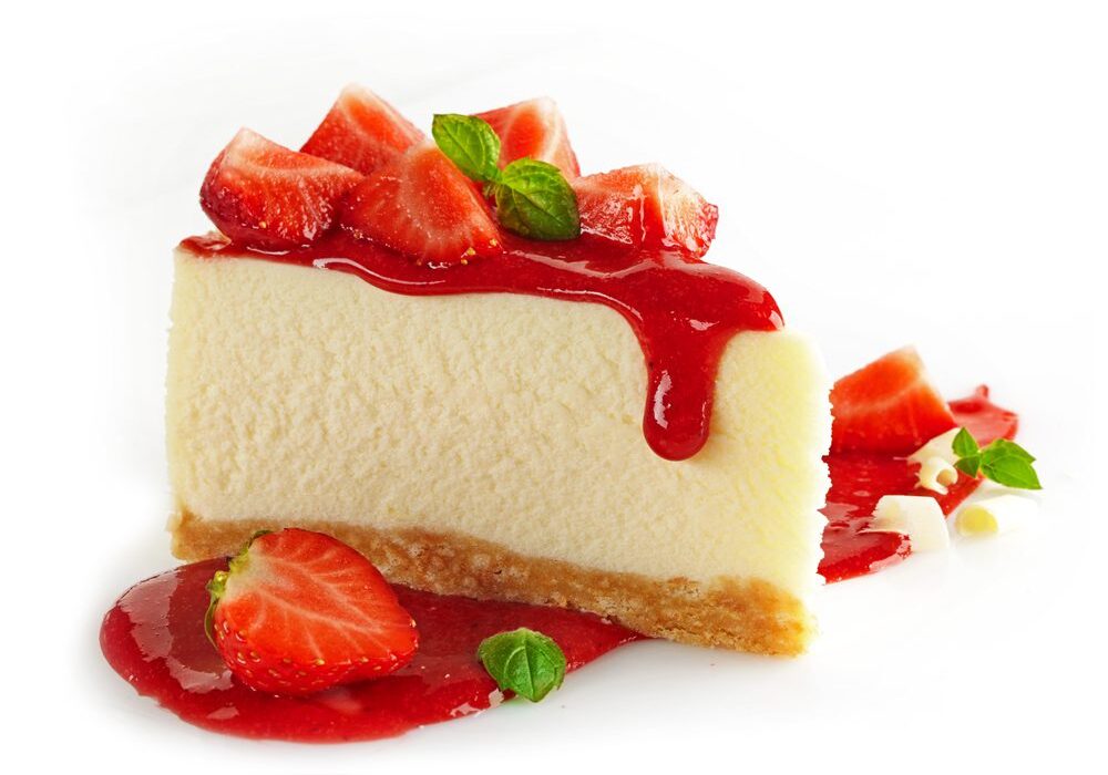 A piece of cheesecake with strawberries on top.