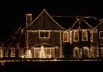 A house with christmas lights on the outside.