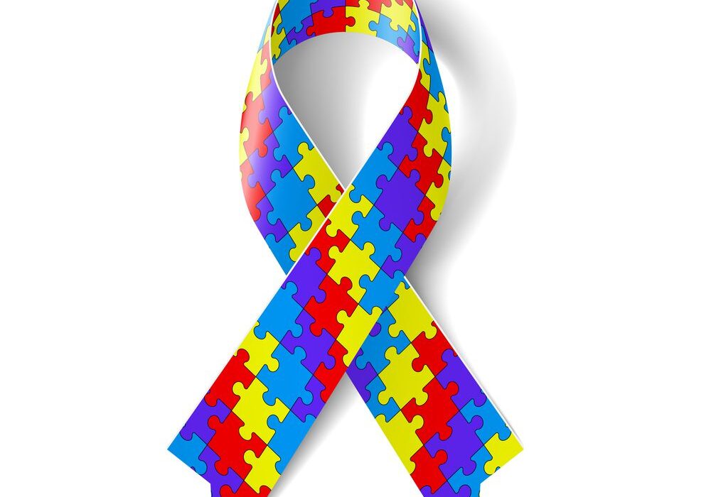 Colorful puzzle ribbon as symbol autism awareness