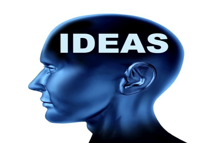 Ideas and creativity symbol represented by an isolated human head with the word idea on the brain.