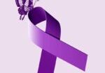 A purple ribbon with a butterfly on it.